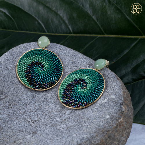 Green spiral earring..