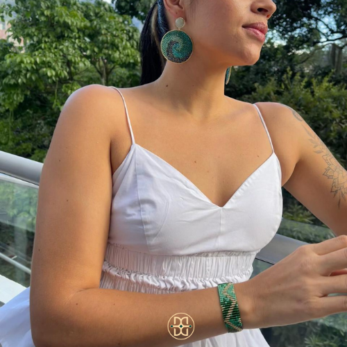 Green spiral earring..