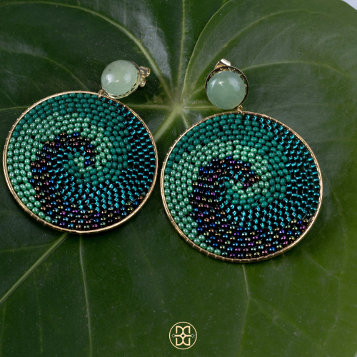 Green spiral earring..